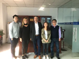 Outdoor bag buyer and Hongzhao team reviewing an OEM ODM project