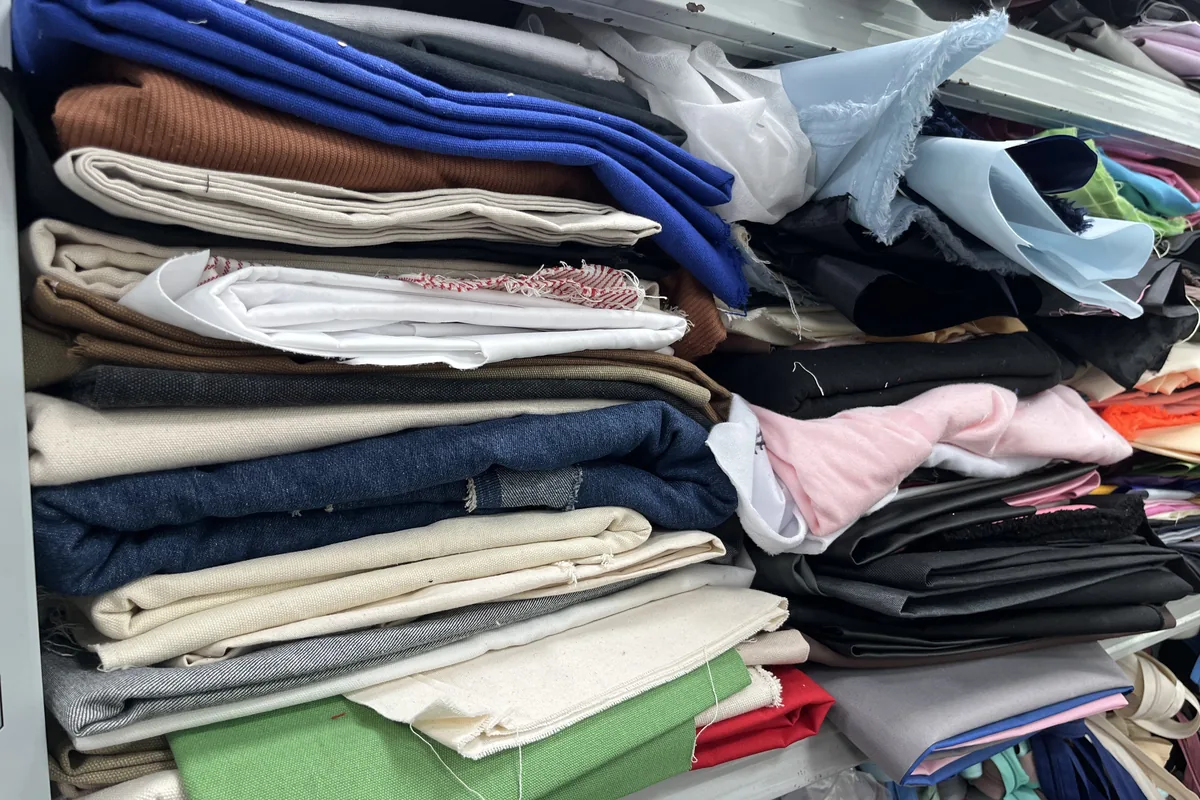 Stacked backpack fabric rolls available for material and handfeel comparison