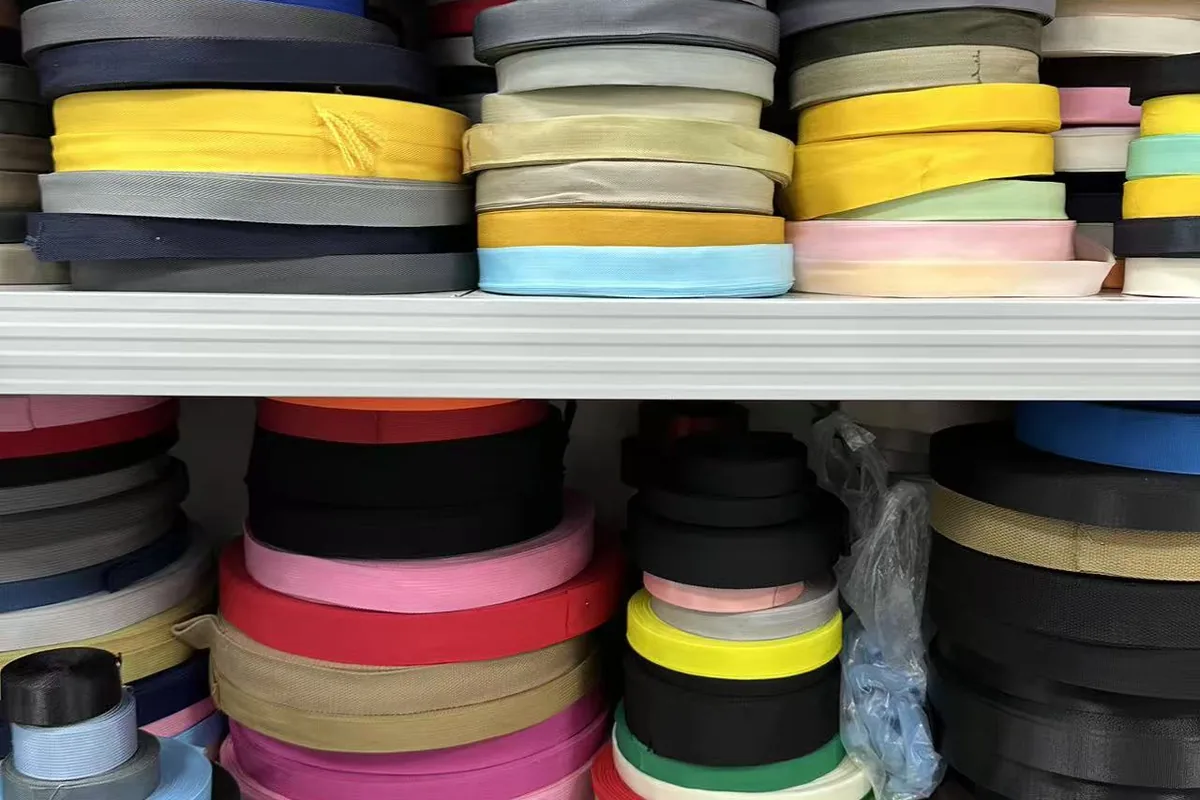 Color webbing options compared with backpack shell fabric during component selection